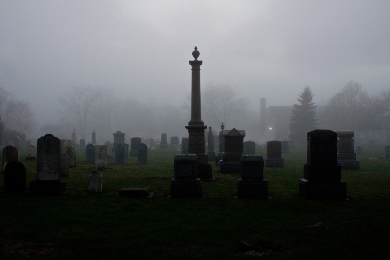 Unsplash photo of graveyard shrouded in fog. Credit Scott Rodgerson.